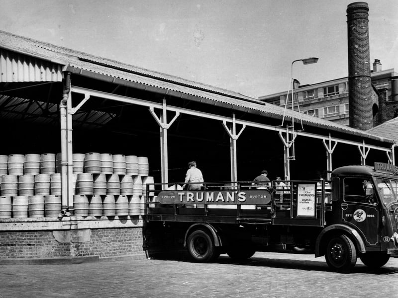 Truman's Brewery was founded in around 1666, originally as Black Eagle Brewery, in East London. In 1873, after buying Philips Brewery in Burton, it became the largest brewery in the world. The brewery closed in 1989, though the brand has since been revived. This photo shows barrels of beer being loaded onto a truck at Truman's Brewery in 1959.