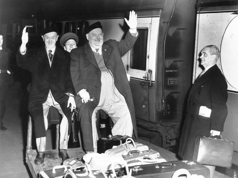 Stan Laurel and Oliver Hardy at the Caledonian Railway Station in Edinburgh in April 1954. The actors were on their way to stay at the Caledonian hotel whilst they were appearing at the Empire Theatre.