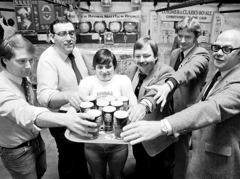 Beer drinkers help themselves to a pint at the CAMRA (Campaign for Real Ale) festival at Edinburgh's Caledonian Brewery in May 1985. The Caledonian Brewery closed in 2022 after 153 years, aving been established in 1869. Heineken agreed a deal to continue making Caledonian's main brands - Deuchars, Coast to Coast and Maltsmiths - at Dunbar's Belhaven brewery.