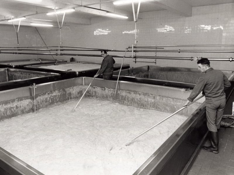 Workers in the fermenting room skimming the yeast from the vessel tops at Sheffield's William Stones Cannon Brewery in January 1990