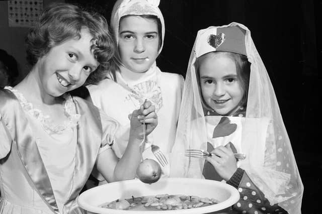 Brownies dooking for apples in 1964.
