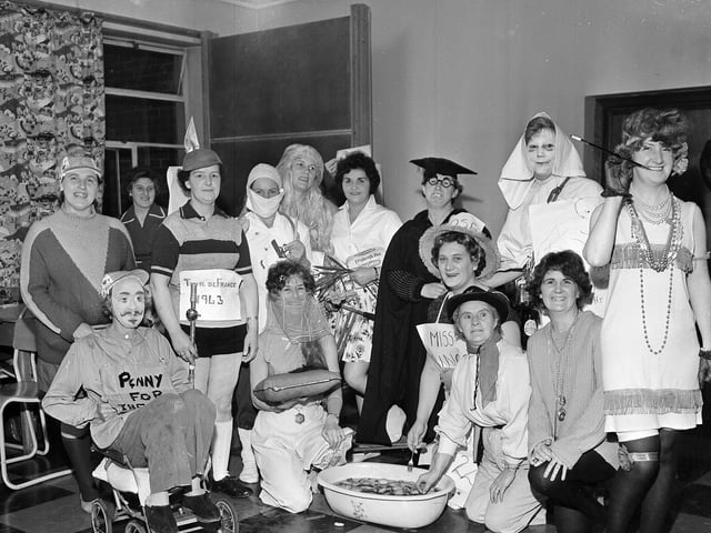The Women's Guild at the Gilmerton Dykes Association preparing for their fancy dress parade in 1962.
