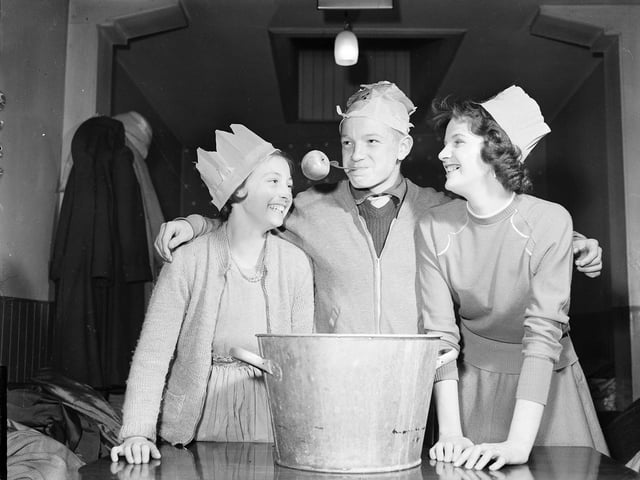 Dooking for apples at the Epilepsy Association Halloween Party in 1958.