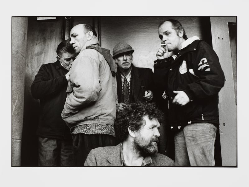 Black and white photograph entitled 'Group of five men' from Great Eastern Hotel Series, by Jane Evelyn Atwood, 1994