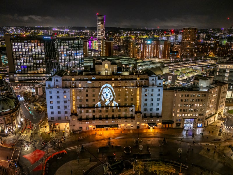 One Second Lovestory by Dirk Rauscher is projected on to the Queens Hotel.