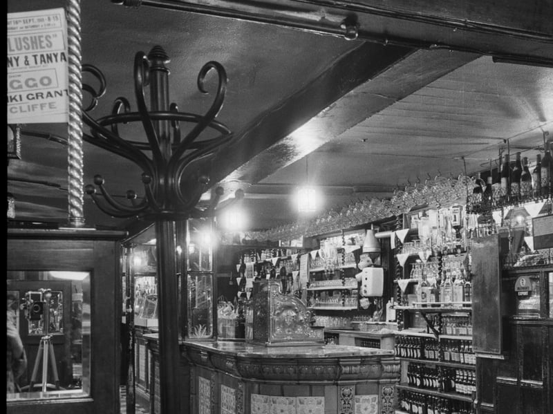 Whitelock's pub, Turk's Head Yard, Leeds, West Yorkshire, pictured sometime between 1955 and 1980. The building, which includes the pub, kitchen and stores, dates to the 18th century.
