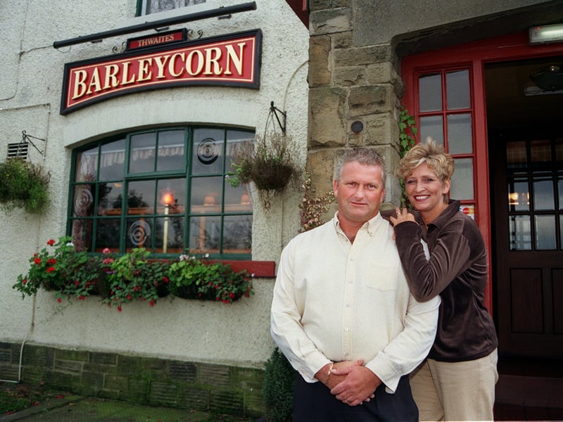 Landlords Mike and Vivienne Williamson outside the Barleycorn pub in Collingham, West Yorkshire, in 1999