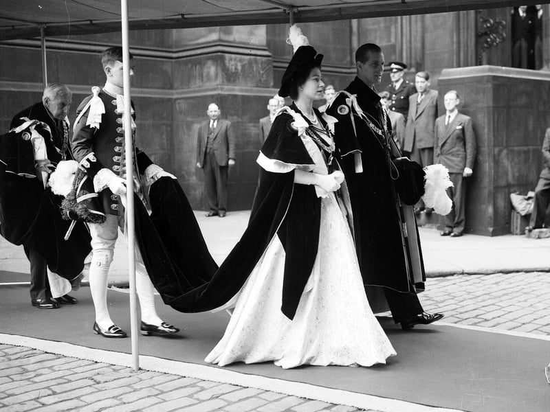 Queen Elizabeth II walking to Signet Library from St Giles' Cathedral after a service during her Coronation visit in 1953.
