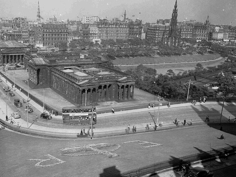 View from top of Mound in Edinburgh with a tram making its way uphill in 1953.