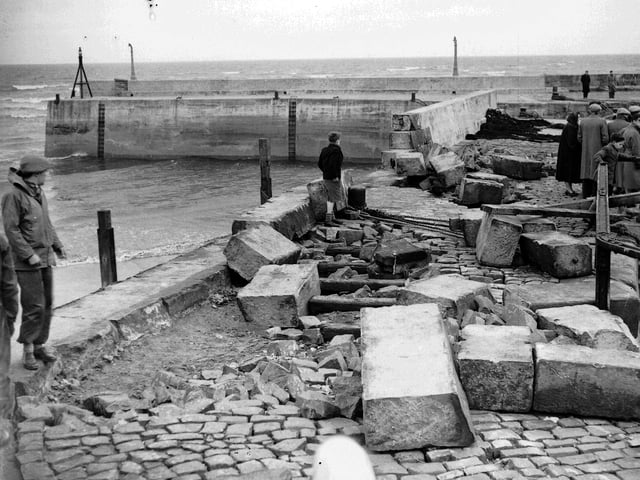 Damage to the seawall at Fisherrow Harbour in Musselburgh after gales hit in February 1953. 