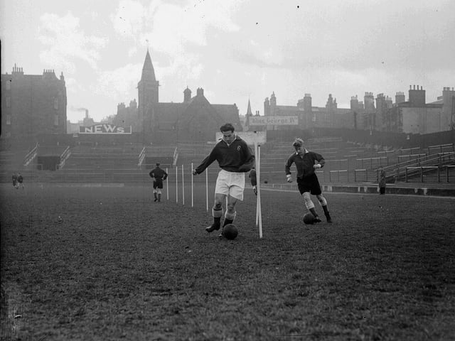 Hearts football team training at Tynecastle in 1953 - Davie Laing and Willie Bauld show their skills