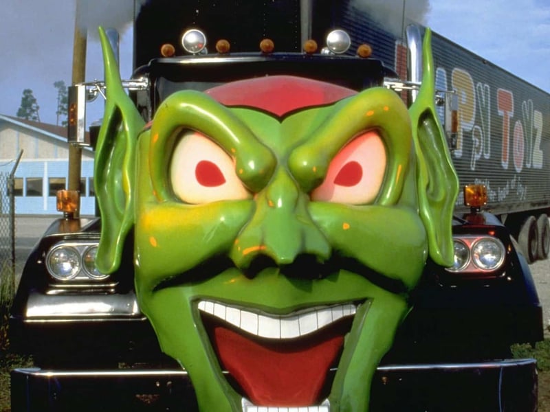 This notoriously cheesy horror film is Stephen King's only directorial effort, and it's a critical laughingstock (15% RT score) about trucks coming to life. The entire film is essentially a very long music video for AC/DC, who recorded their album Who Made Who specifically for the movie. The hard rock soundtrack—featuring hits like the title track and 'You Shook Me All Night Long'—delivers constant, raw energy, providing the only real thrills in a movie that utterly lacks subtlety or cinematic quality.
