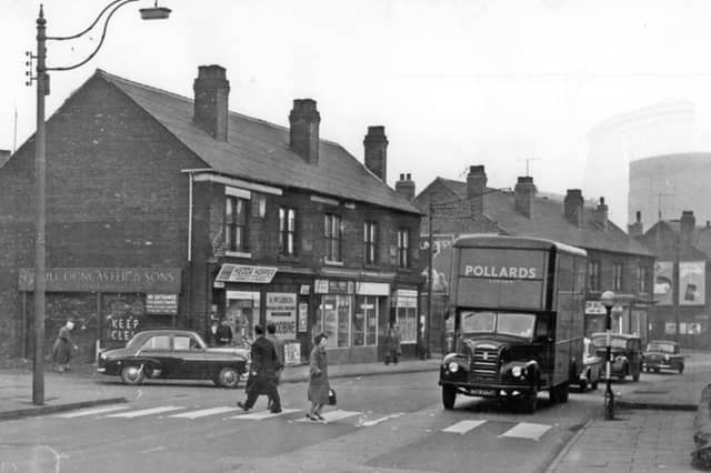 Penistone Road, Neepsend, Sheffield, in March 1963, showing Achibold Mc.Gibbon, newsagent, and other businesses