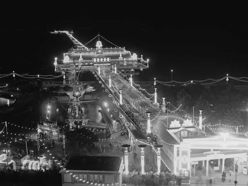 Southend Pier, in Essex, illuminated at night in 1951