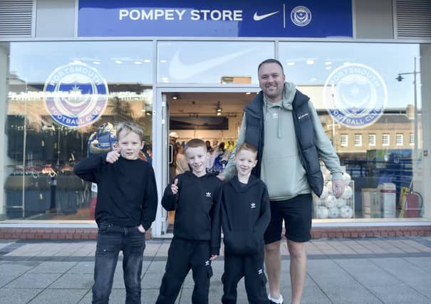 Billy Warburton with his sons (l-r) Freddie, Ralphie and George, at the opening of the Pompey Store in Gunwharf Quays.
