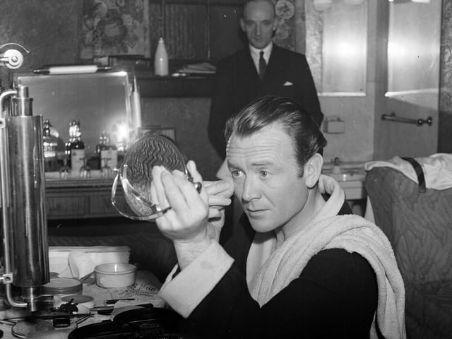 Stage and film actor Sir John Mills backstage in the King's Theatre, Edinburgh, in April 1950 where he was appearing in 'The Damascus Blade'.