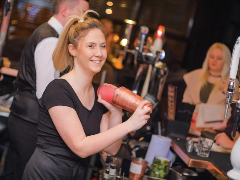 Making up a drink for one of the customers at the busy Grotto night out 9 years ago.