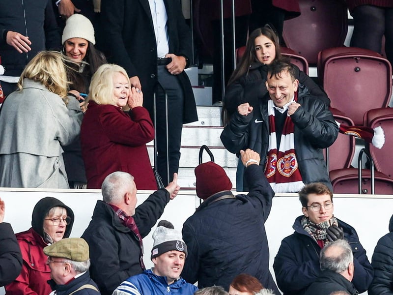 Tony Bloom celebrates with Hearts fans.