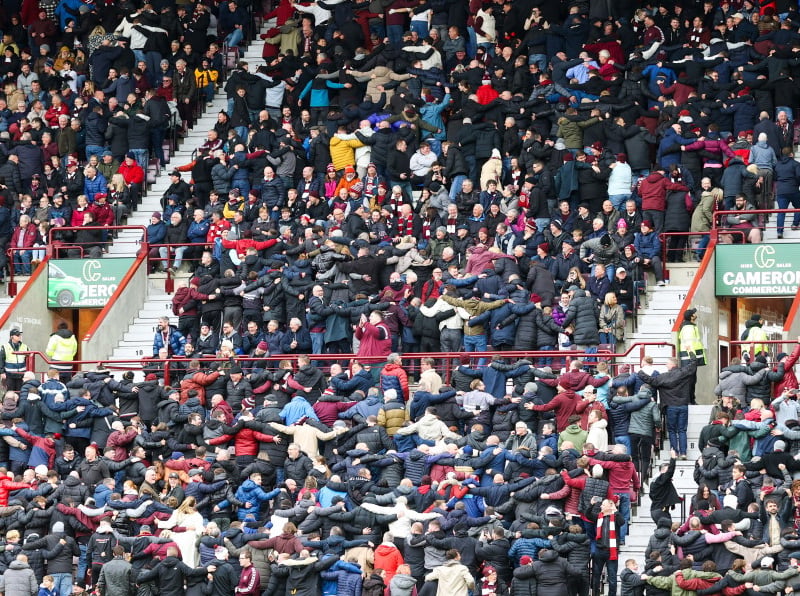 Hearts fans do the Poznan in celebration