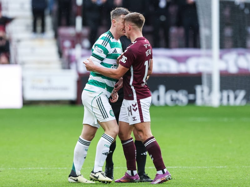 Celtic's Callum McGregor (L) and Hearts' Cammy Devlin during a William Hill Premiership match between Heart of Midlothian and Celtic