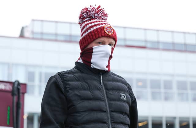 Hearts fans arrive at the stadium ahead of a William Hill Premiership match between Heart of Midlothian and Celtic