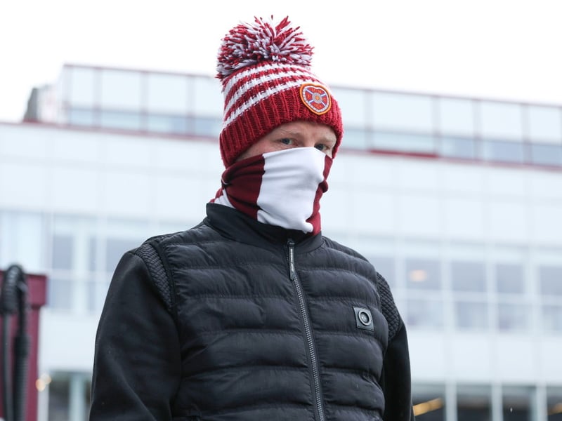 Hearts fans arrive at the stadium ahead of a William Hill Premiership match between Heart of Midlothian and Celtic