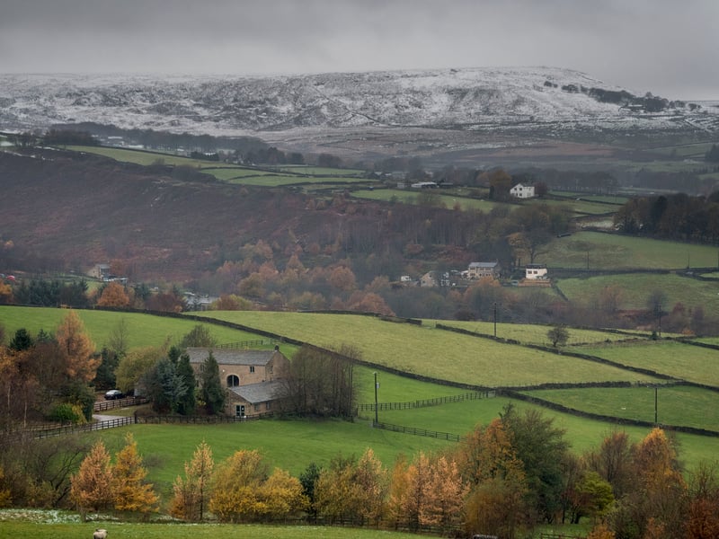 Completing the top five is The Peak District, which recorded 498,000 visitors this winter, up 48% from 2019. The national park's accessibility from major population centres makes it an ideal weekend destination for winter walks and outdoor activities. Pictured is snow covering the hilltops near Meltham in the Peak District National Park, West Yorkshire.