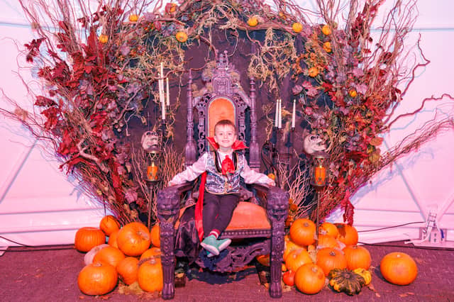 Iker on the throne at Pumpkinville in Gunwharf.