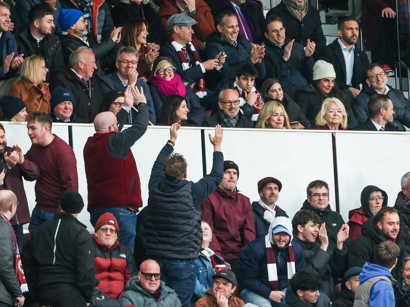 Hearts fans show their appreciation as they celebrate the mammoth win over Celtic at Tynecastle.