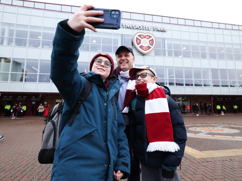 Hearts fans arrive at Tynecastle ahead of the game with Celtic.