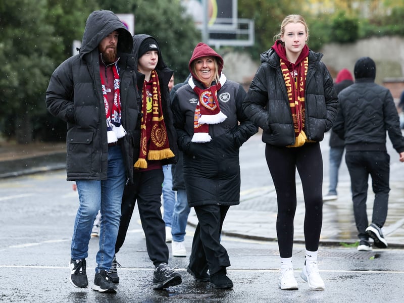 A Hearts supporting family arrive at Tynecastle ahead of the game with Celtic.