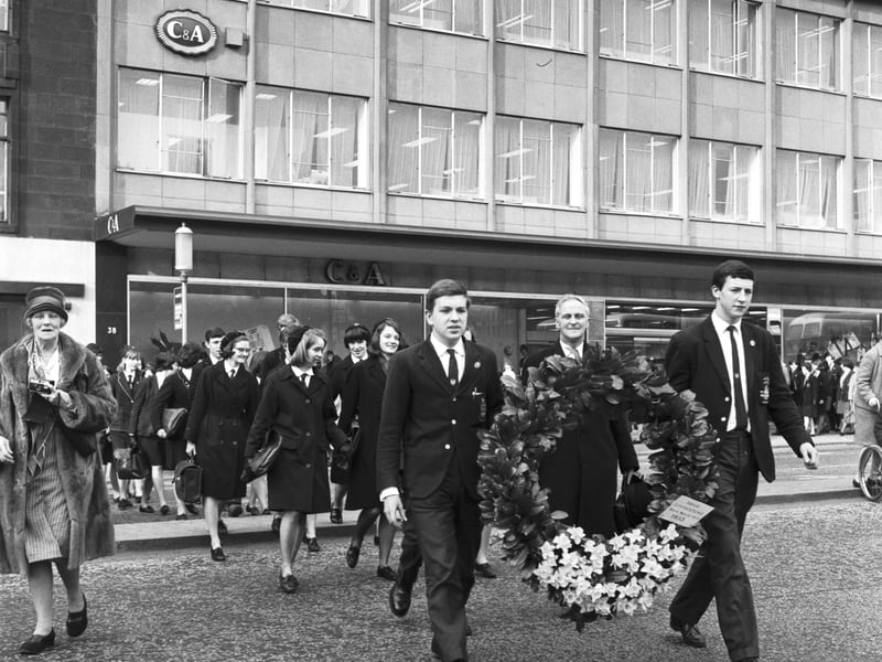 Boys from George Watson's College carry a wreath across Princes Street during the birthday celebrations in memory of David Livingstone.