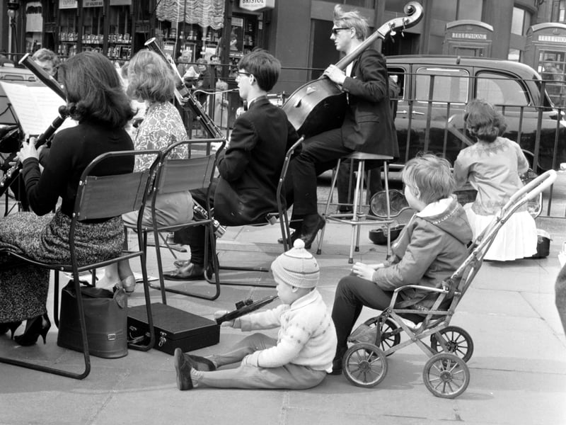 A view of the students charities day showing the University Musical Society playing chamber music at the west end of Princes Street in April 1966.