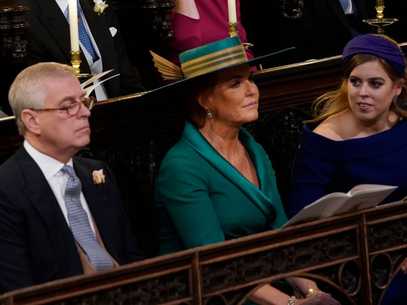 Prince Andrew, Duke of York Sarah Ferguson and Princess Beatrice of York attend of the wedding of Princess Eugenie of York and Mr. Jack Brooksbank at St. George's Chapel on October 12, 2018 in Windsor, England