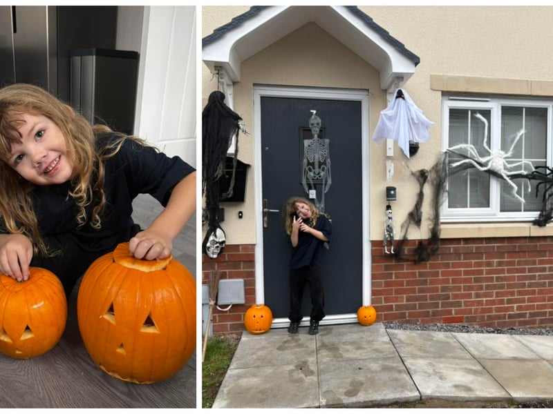 Chantelle Kara Martin shared this photo of a little one with two admirably done pumpkins and a solid decorating all ready for the big night.