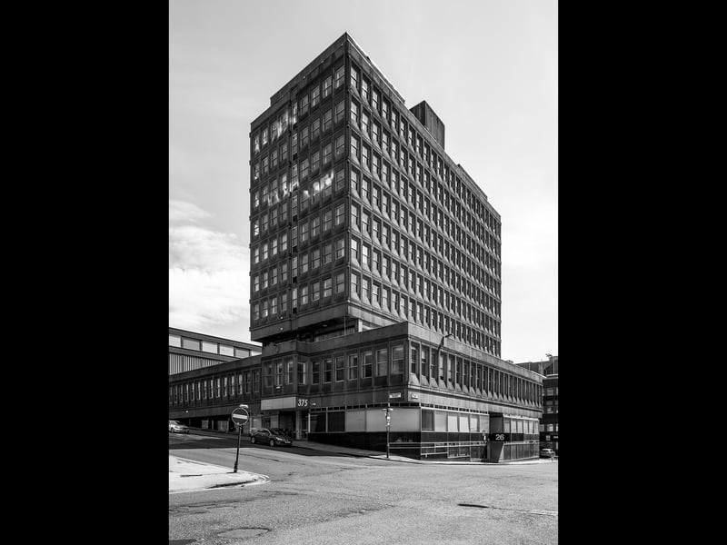 Pegasus House rises with the quiet authority of a building unconcerned with charm. Designed by Derek Stephenson & Partners and completed in 1970, it was conceived as an office block defined by disciplined verticals and a precise precast concrete modular grid. Presenting an image of efficiency and purpose, only slightly undermined by its years of disuse when the staining of weather and city life weighed heavily on its facades, it has now been made over as an hotel. Despite new signage and cladding the original modernist rhythm persists. The design reflects the pragmatic optimism of 1970s Glasgow, when new commercial buildings aimed to project progress and permanence through structure and repetition. Pegasus House endures as a representative example of the city’s late-modern commercial architecture.