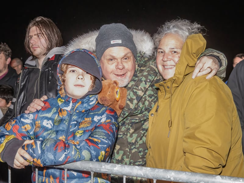 Excited crowds gathered in anticipation of the lighting of the bonfire.