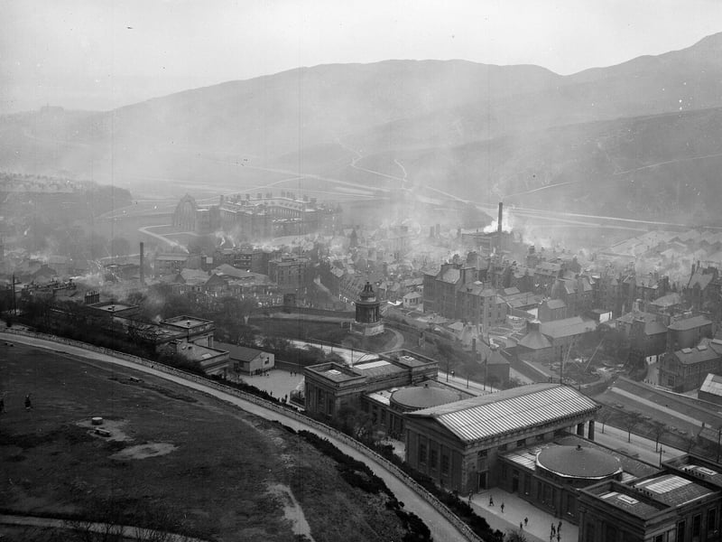 A view over the smoky chimneys of the houses and factories in the Old Town, at the foot of the Royal Mile, in 1955.