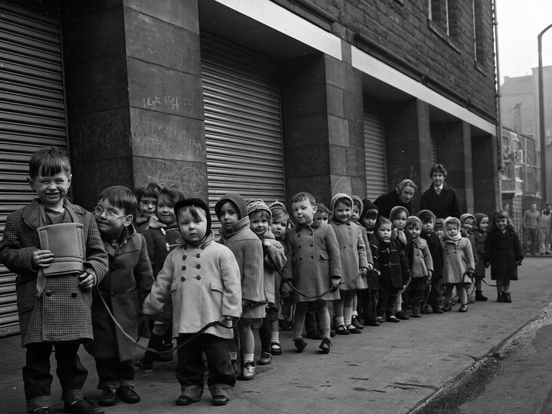 Cowgate Nursery School children out for a walk on George IV Bridge.