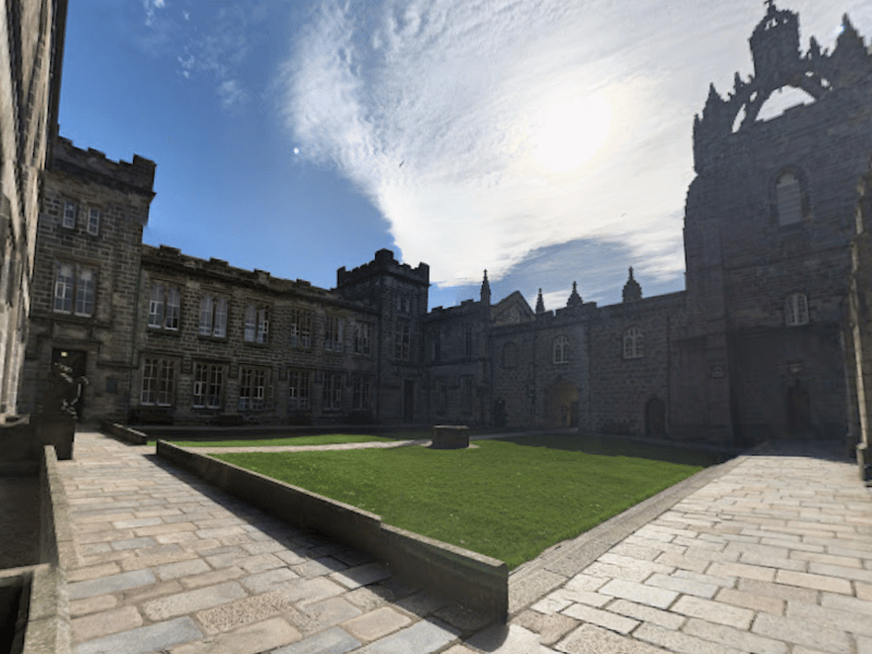 This granite city campus combines coastal beauty with historic charm. The distinctive grey stone buildings catch the light beautifully, while the nearby coastline offers dramatic clifftop walks. Students get both urban sophistication and rugged Scottish coastline on their doorstep.