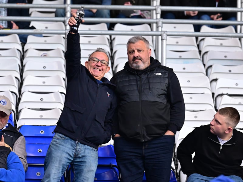 Pompey fans defiantly backed their team as they were battered 4-0 at Birmingham City. Pic: Dennis Goodwin/ProSportsImages