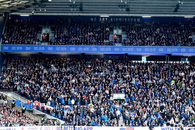 Pompey fans defiantly backed their team as they were battered 4-0 at Birmingham City. Pic: Dennis Goodwin/ProSportsImages