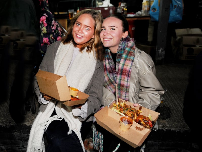 Jen Toombs and Rosie Ryan-Smith of Headingley enjoy some of the food on offer. Organisers said that they had purposefully tried to keep food and drink costs down for attendees.