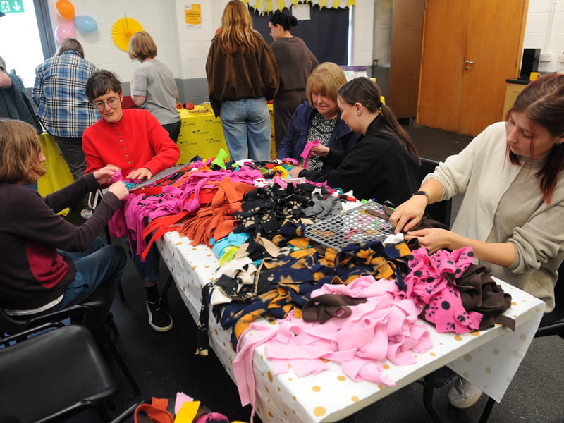 Visitors make Snuffles for the dogs