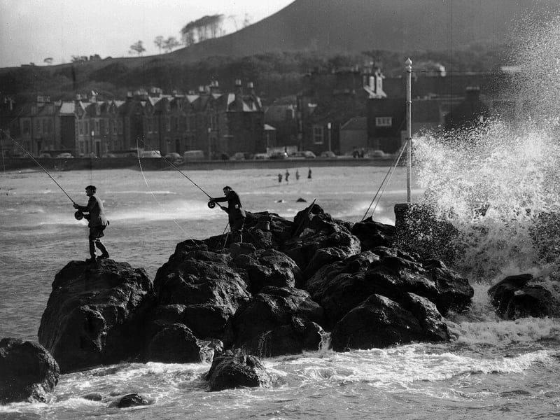 Two anglers battle for a shore prize in the North Berwick Angling Competition 1962.