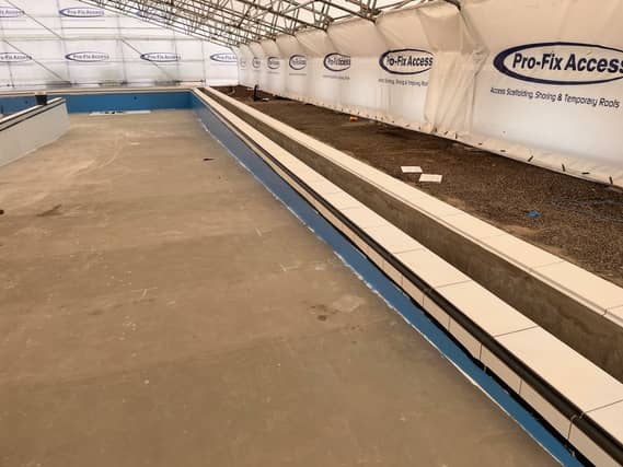 The contractors working on the lido have applied a white base coat on the walls, and have now started on the blue.
Picture: Portsmouth City Council