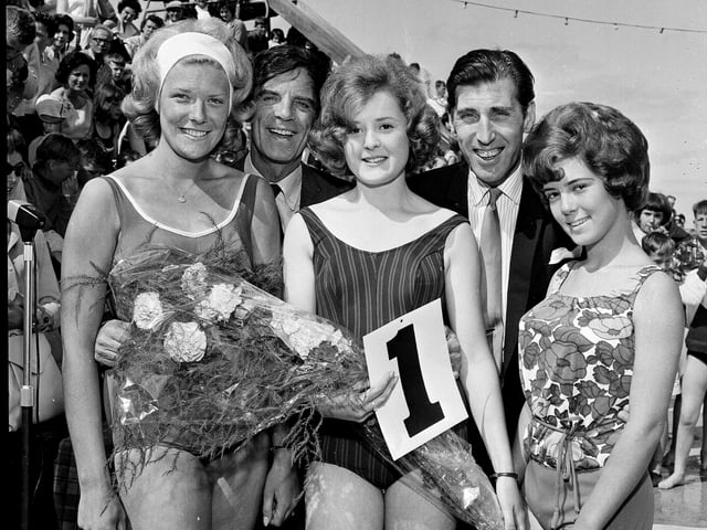 The Dunbar Beauty Queen Contest winners in 1964 with judges Rikki Fulton and Jack Milroy in 1964.