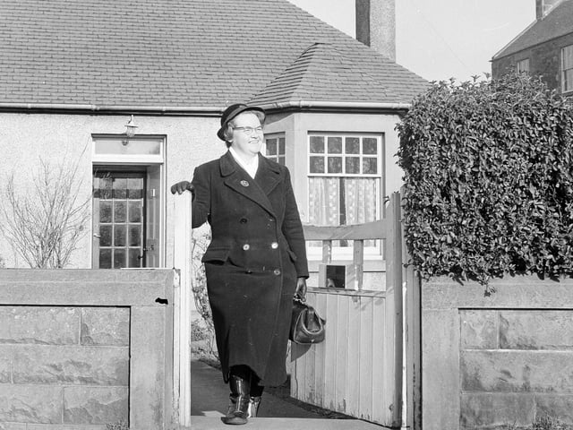 A District Nurse heading out to work from her home in Dunbar.