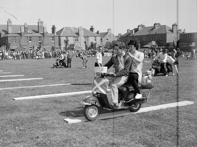 A couple taking part in the Dunbar Scooter Rally novelty race in  May 1961.