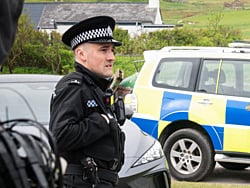 Glasgow-born actor Conor McCarry returns as PC Alex Grant in Shetland's latest series. Having been a regular on the show since series 5, McCarry is also known for roles in BBC's Time, Outlander - where he played young Jamie - and will soon appear in an upcoming BBC project. 
